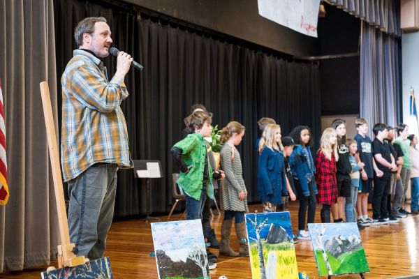 Brad emceeing a performance for SFF's Studio to Schools grant in the spring of 2019.