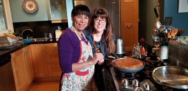 Marti and Chef Josef making something delicious.